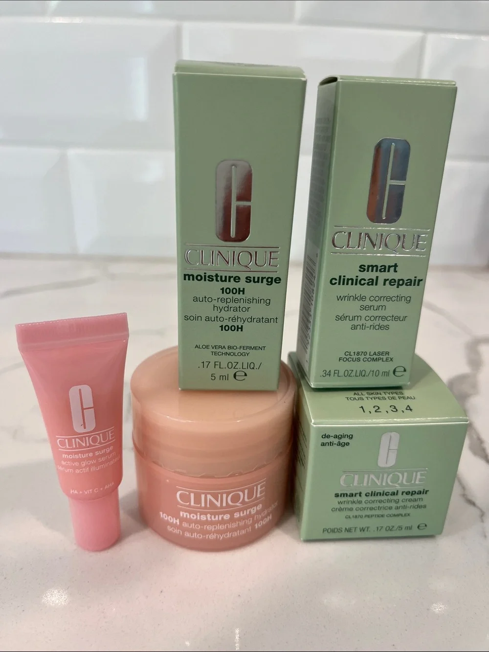 Clinique Moisture Surge and smart clinical products. Brand new, never opened